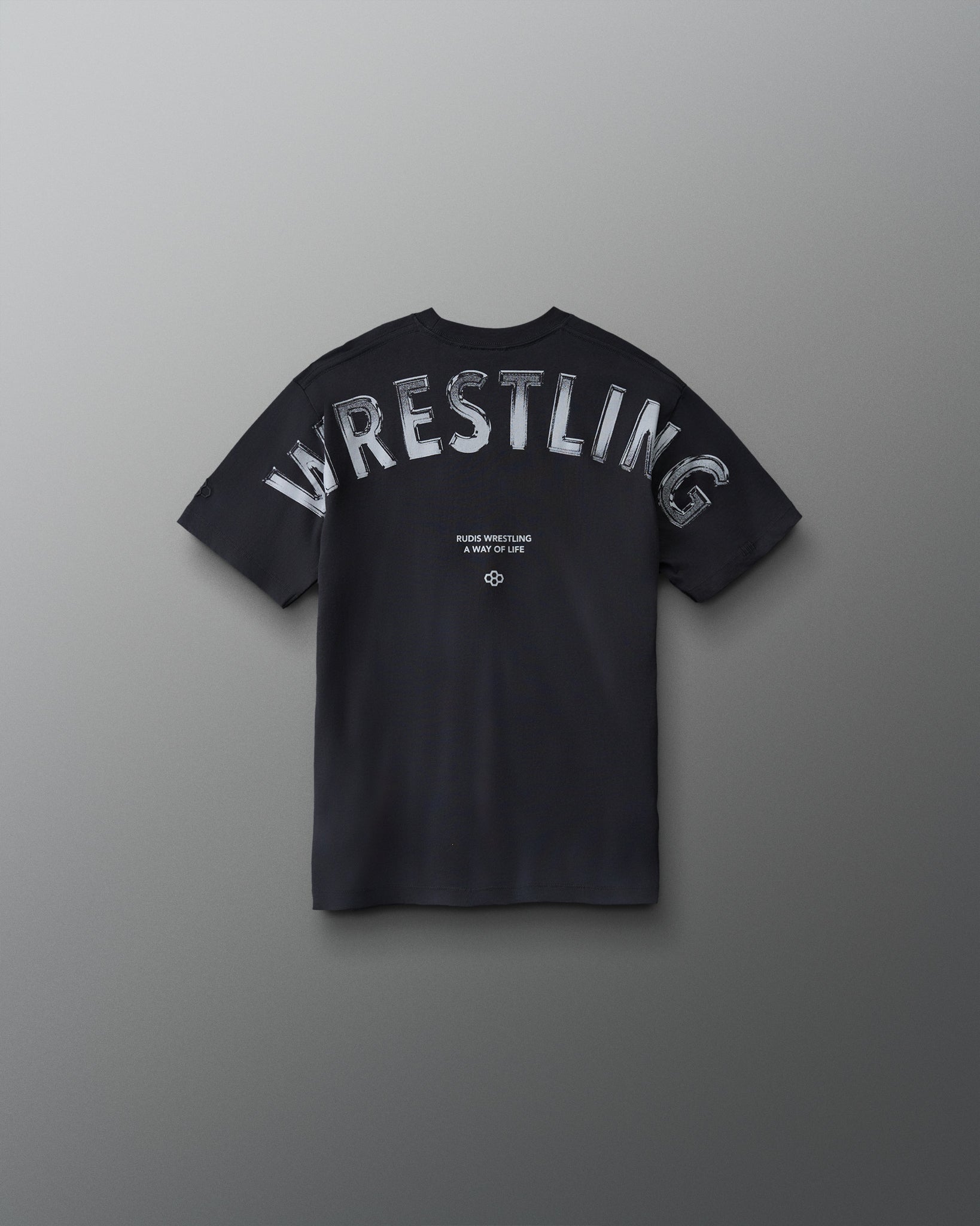 Front view of RUDIS Wrestling Back Youth Relaxed Cotton T-Shirt in Black featuring a contrasting light RUDIS chest logo.