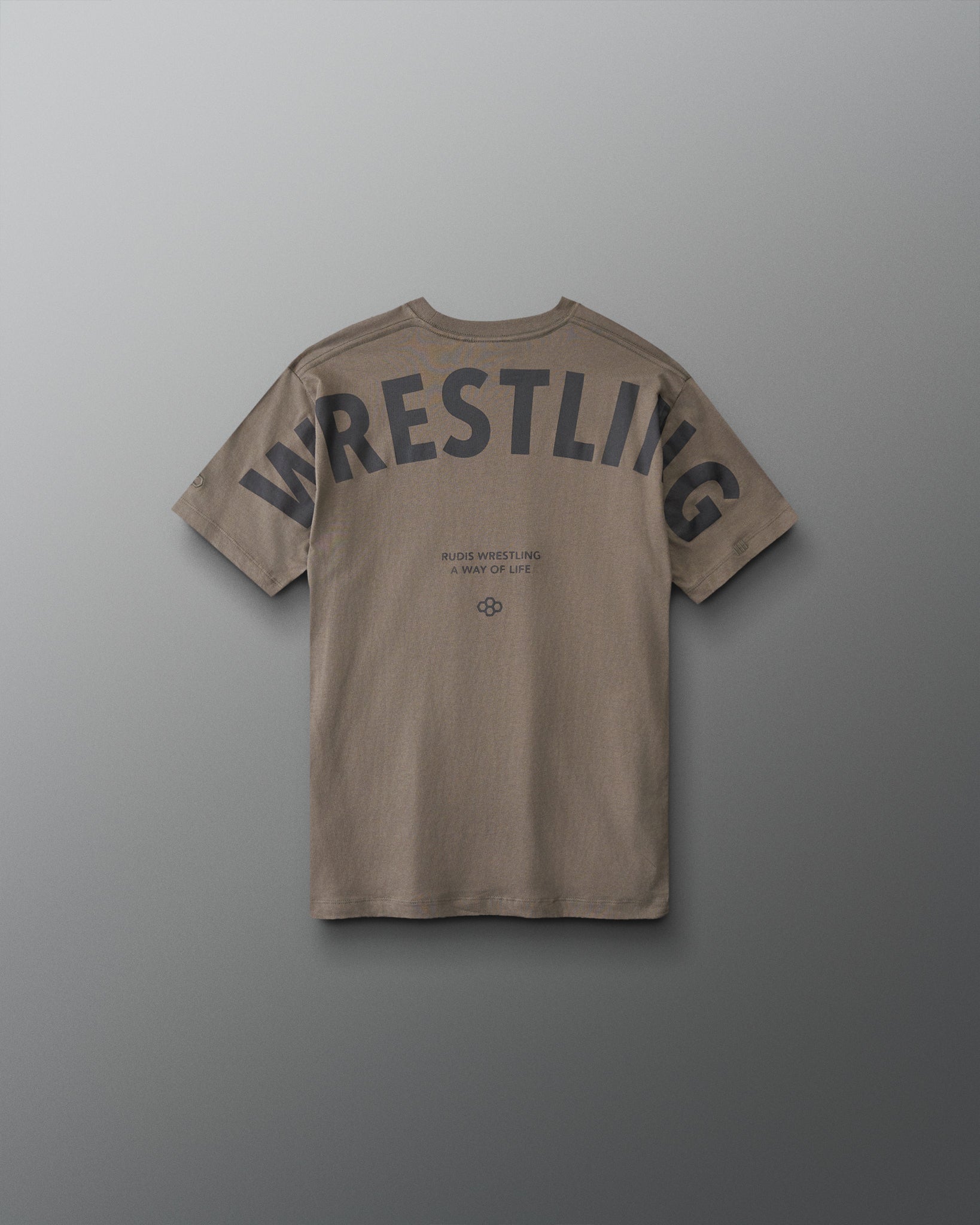 Back view of RUDIS youth wrestling graphic T-shirt in Dark Olive with oversized WRESTLING lettering, A WAY OF LIFE text, and Hex logo.