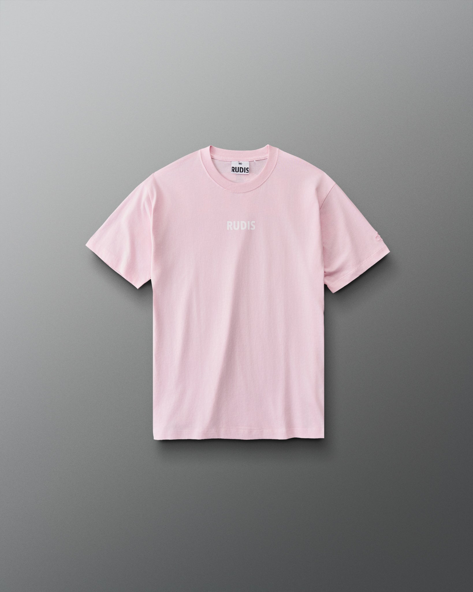 Front view of RUDIS Wrestling Back Youth Relaxed Cotton T-Shirt in Washed Pink featuring a minimal white RUDIS chest logo.