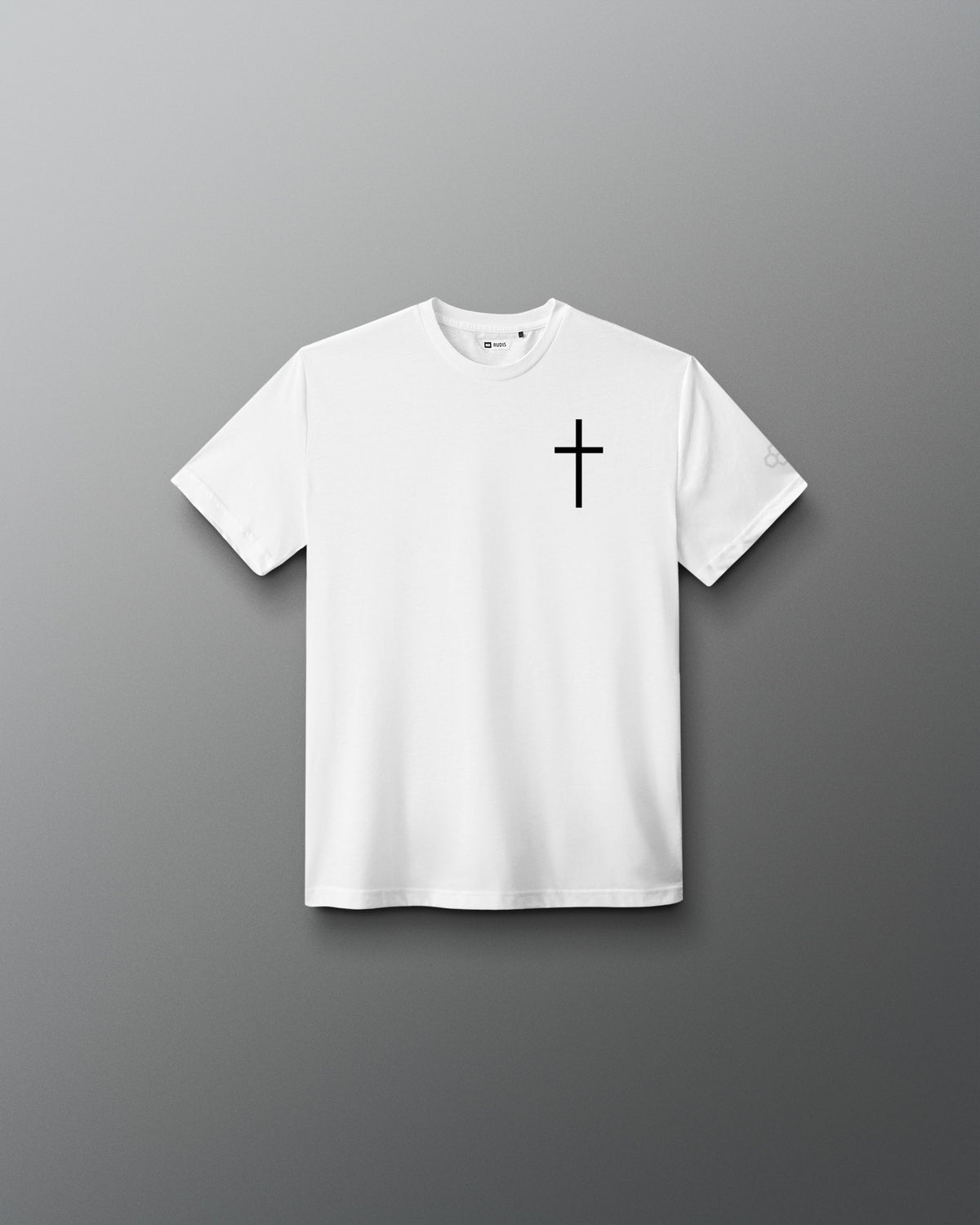 White RUDIS Cross Youth Elite Super Soft T-Shirt featuring a black cross chest graphic and subtle RUDIS sleeve branding.