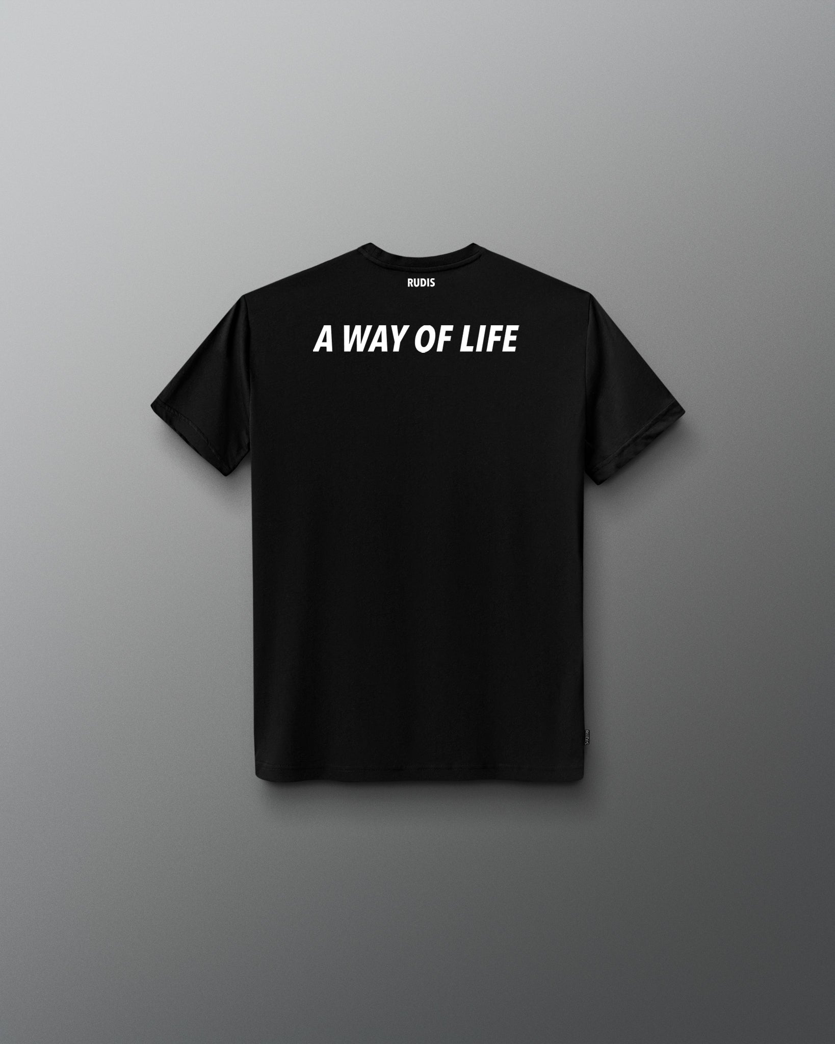 Back view of the youth black RUDIS Core Flag Elite Super Soft T-Shirt, featuring bold white “A WAY OF LIFE” lettering across the upper back with RUDIS branding at the neckline.