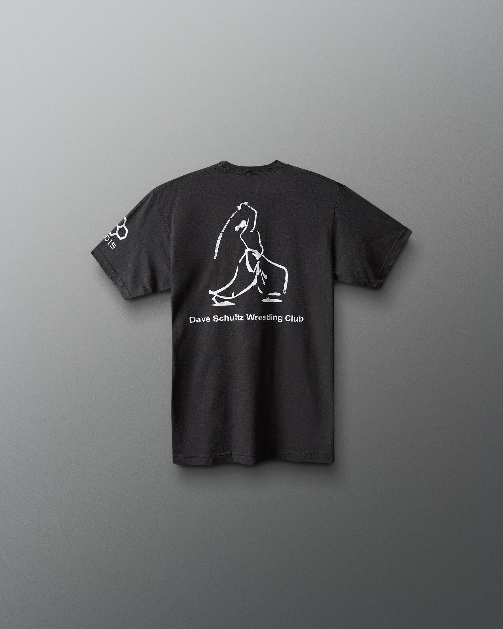 Black t-shirt with white graphic and text on a gray background