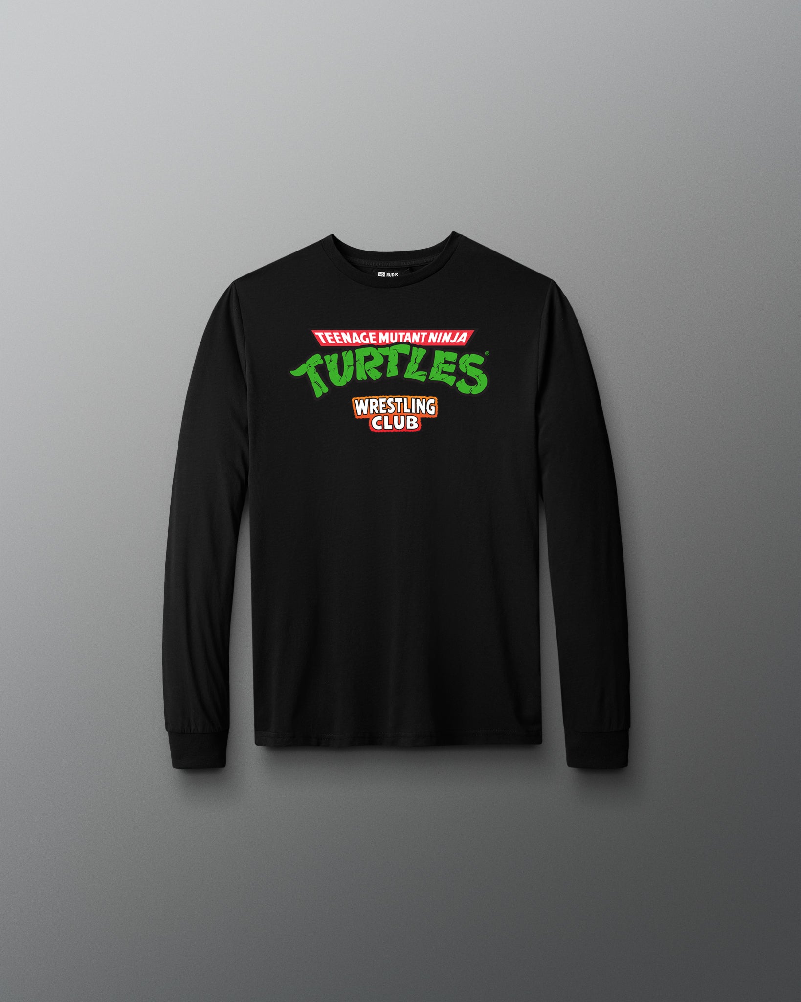 Black long-sleeve shirt with 'Teenage Mutant Ninja Turtles Wrestling Club' text on a gray background