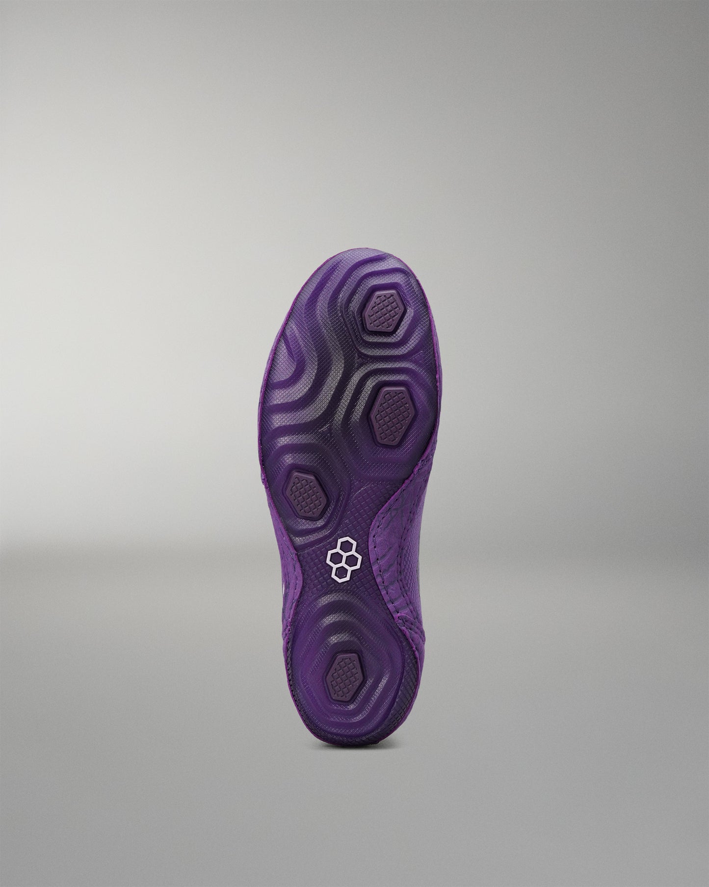 Purple outsole of the RUDIS Colt 4.0 Shredder wrestling shoe.