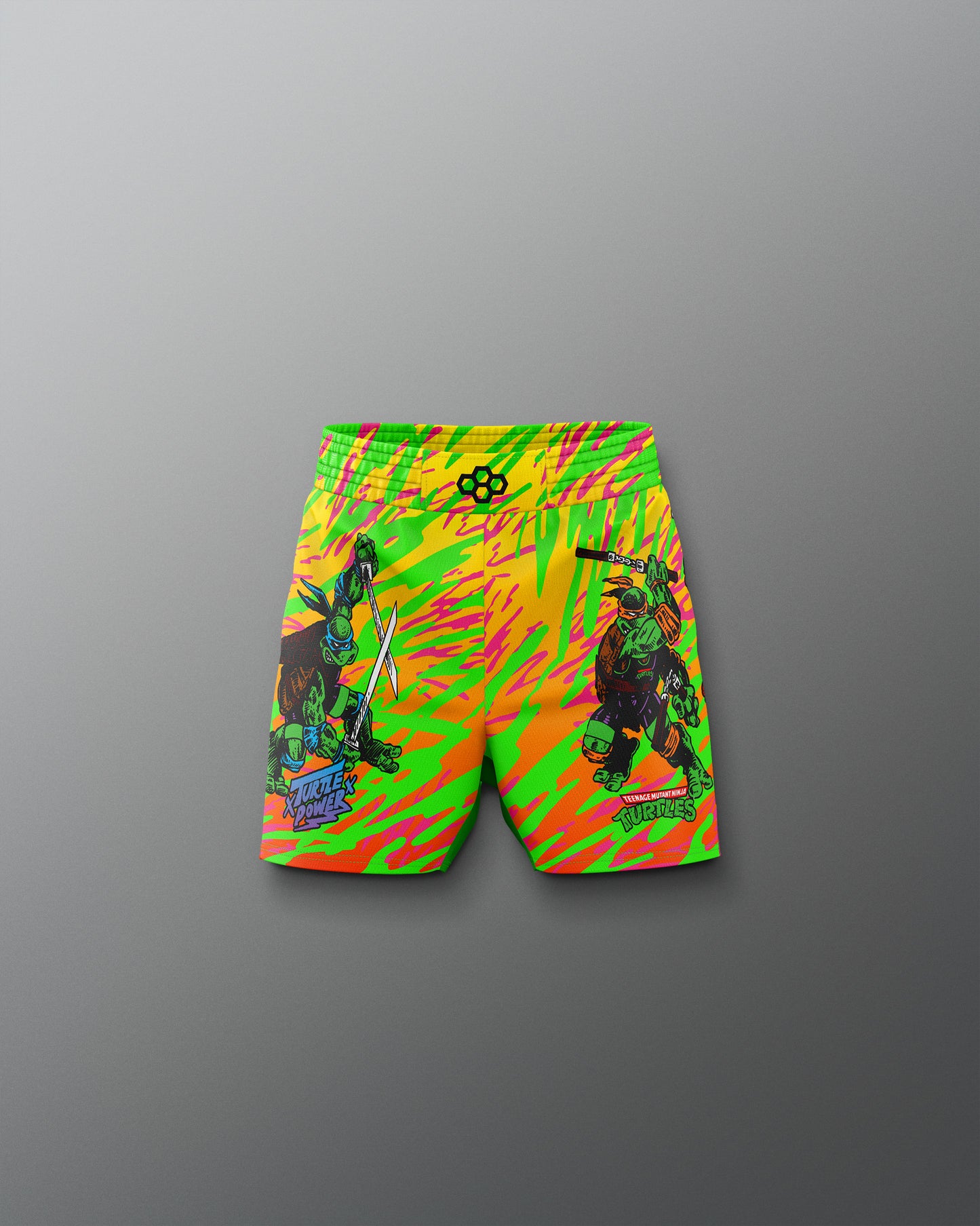 Colorful shorts with a graphic design on a gray background