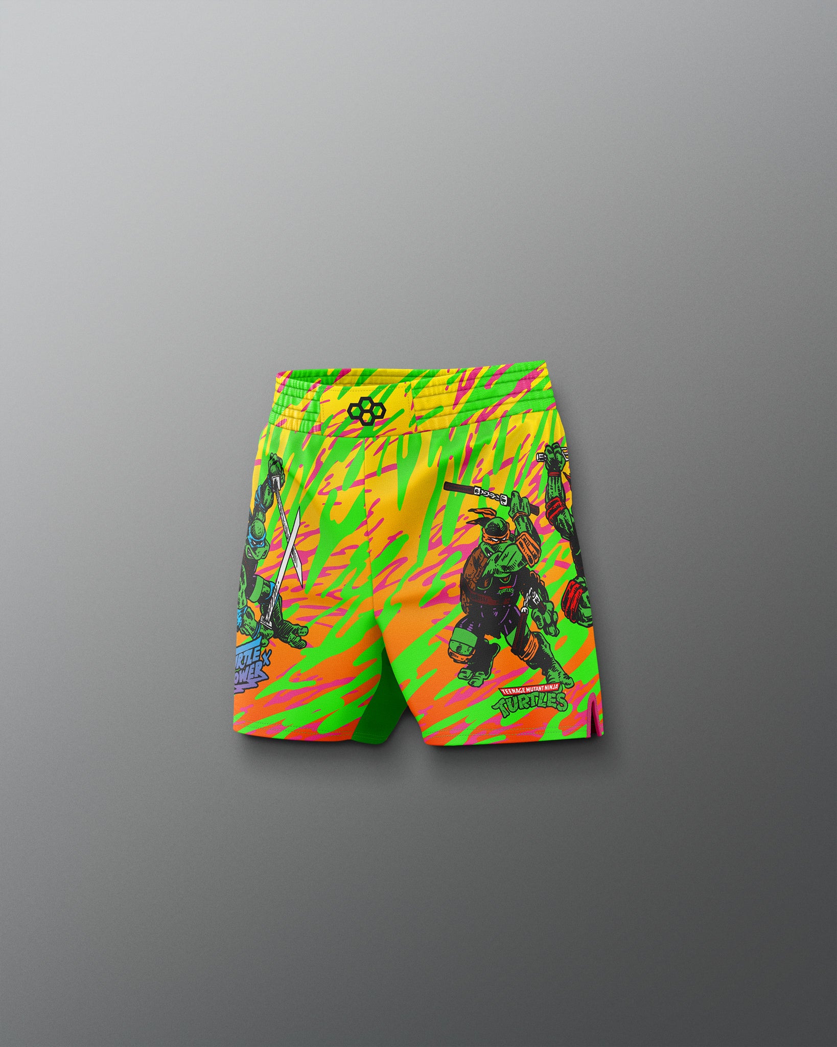 Colorful shorts with a graphic design on a gray background
