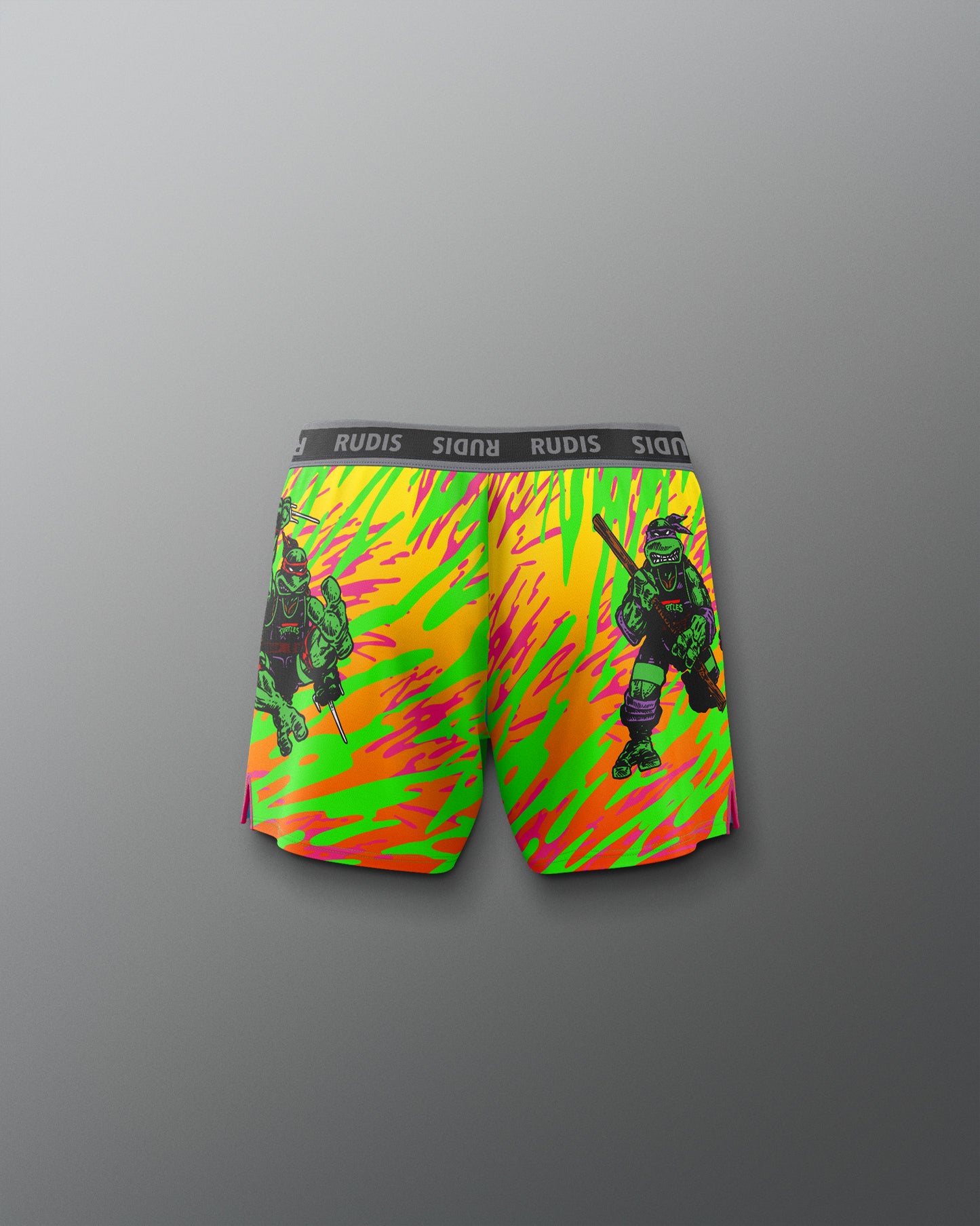 Colorful swim shorts with a graphic design on a gray background