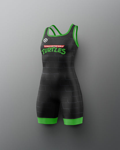 Black and green athletic suit with 'Turtles' text on a gray background. TMNT. Teenage Mutant Ninja Turtles