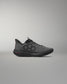 Gray athletic shoe on a gray background