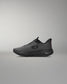 Black athletic shoe on a gray background