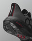 Black and gray wrestling shoe with red accents on a light gray background