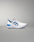 White athletic shoe with blue accents on a gray background