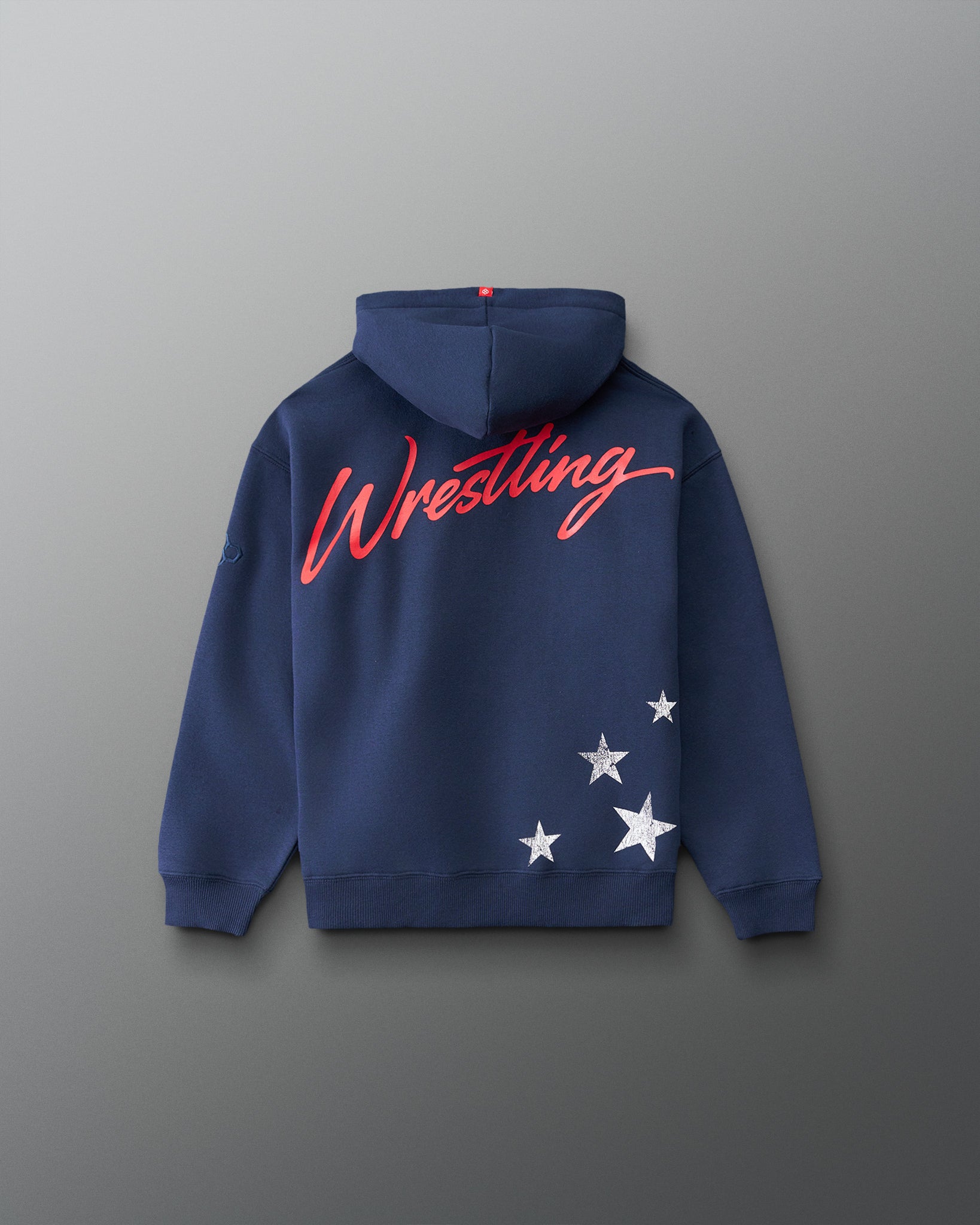 RUDIS USA Wrestling Script Youth Relaxed Comfort Fleece Hoodie in Navy, back view featuring bold red Wrestling script, distressed white stars, and ribbed hem. Copy Alt Text