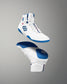 White and blue wrestling shoes on a gray background