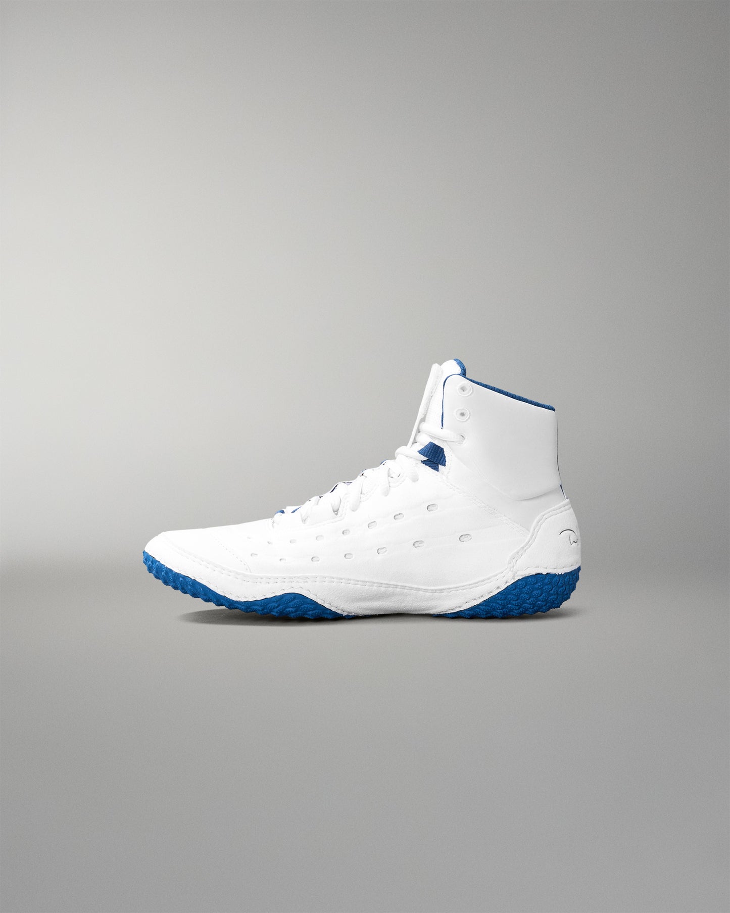 White wrestling shoe with blue accents on a gray background
