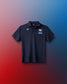 Black polo shirt with USA logo on a gradient red to blue background