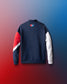 Sweatshirt with color-blocked sleeves on a gradient blue and red background with USA Wrestling logo 