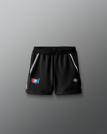 Black shorts with logos on a gray background