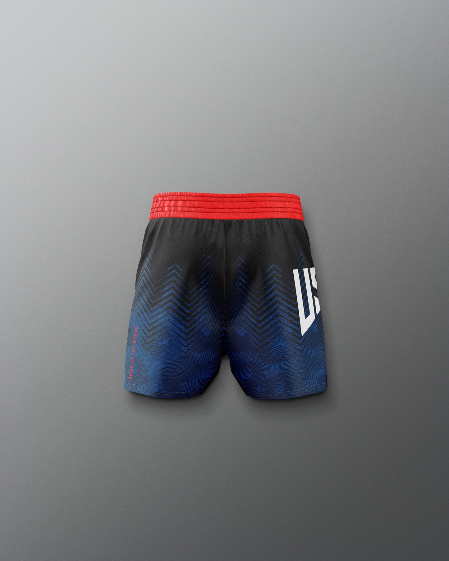 Black and blue athletic shorts with red waistband on a gray background