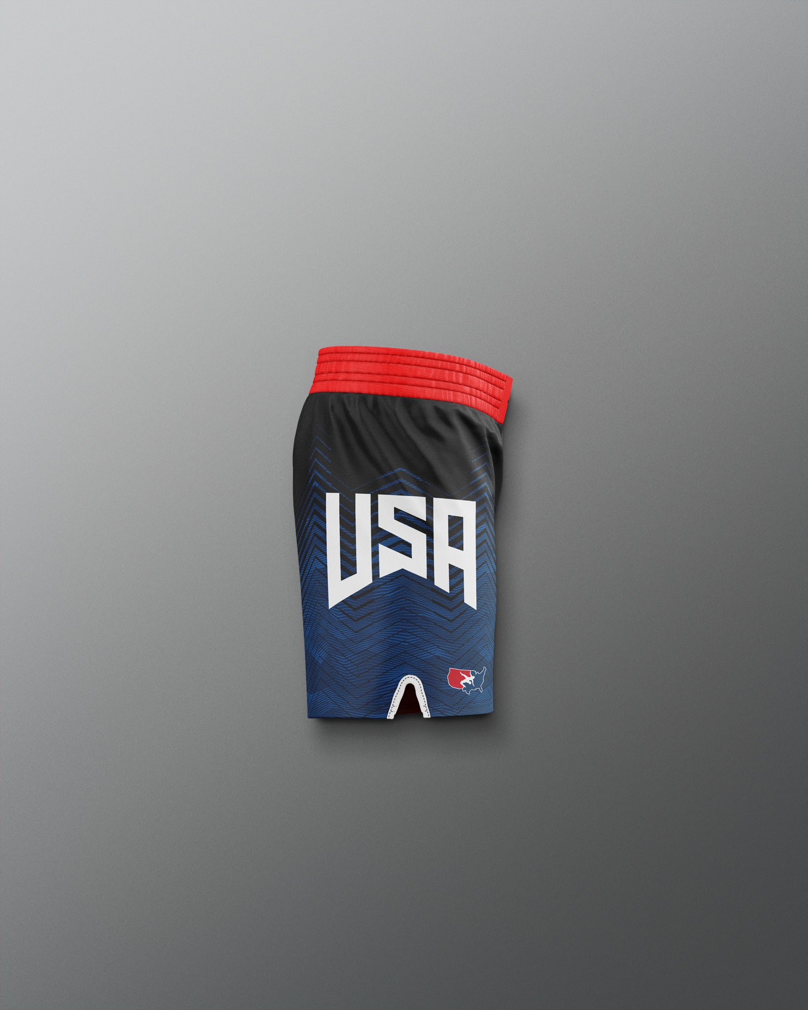 Black athletic shorts with 'USA' text on a gradient blue and red background