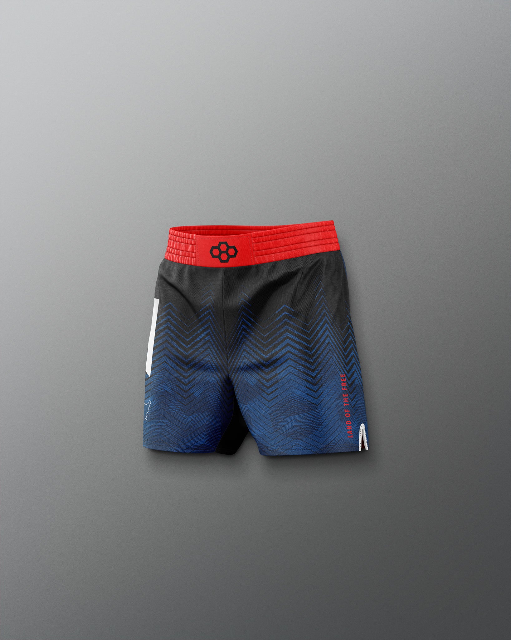 Blue athletic shorts with a red waistband on a gray background