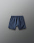 Blue shorts on a gray background