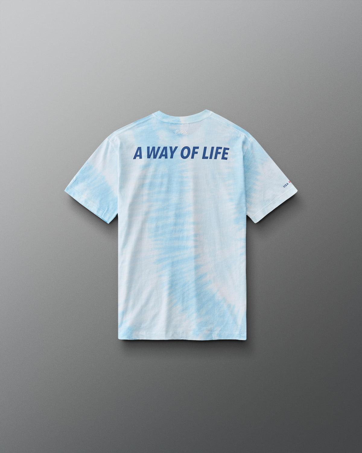 RUDIS USA Wrestling Map Youth Classic Cotton T-Shirt in Blue Tie Dye, back view featuring bold navy A WAY OF LIFE lettering, RUDIS branding, and a blue tie-dye pattern.