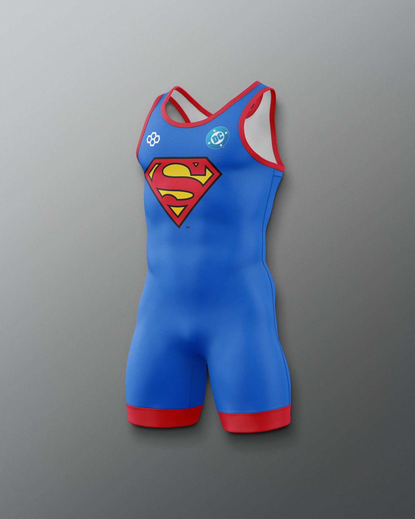 Angled view of RUDIS Superman Logo Youth Elite 2.0 Wrestling Singlet featuring a blue design, red trim and Superman shield graphic.