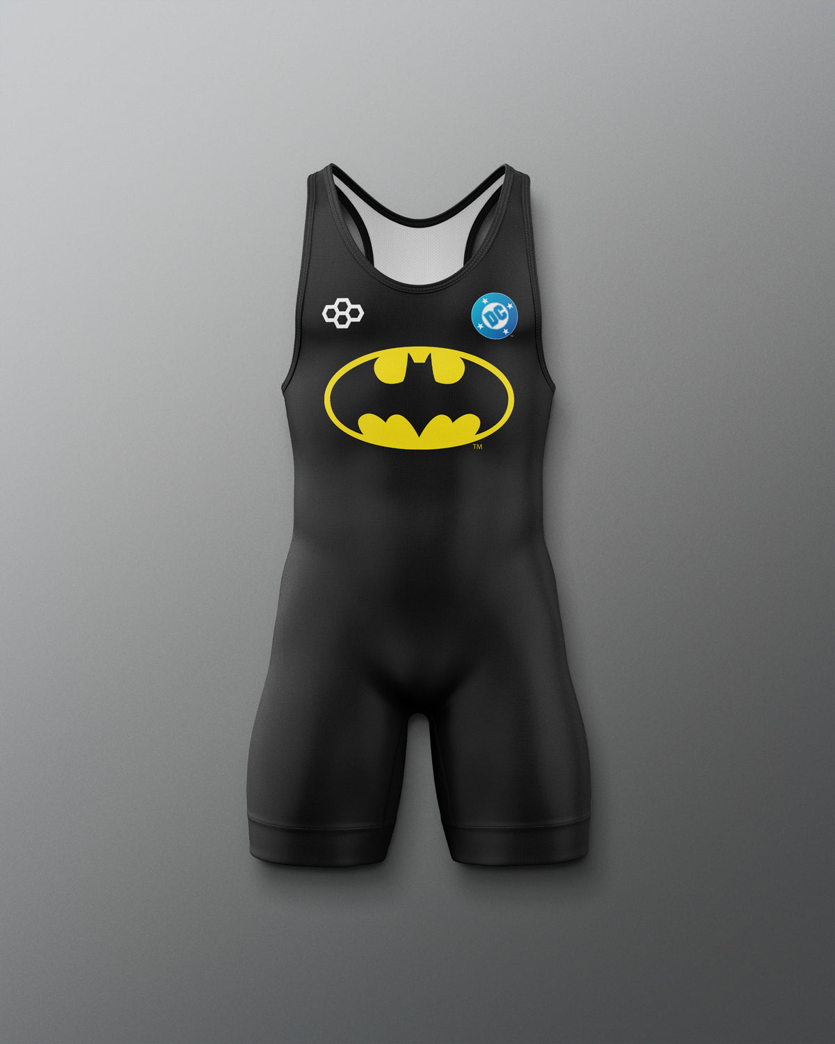 Front view of the black RUDIS Batman Logo Youth Elite 2.0 wrestling singlet featuring the yellow Batman logo, DC emblem, and RUDIS mark.