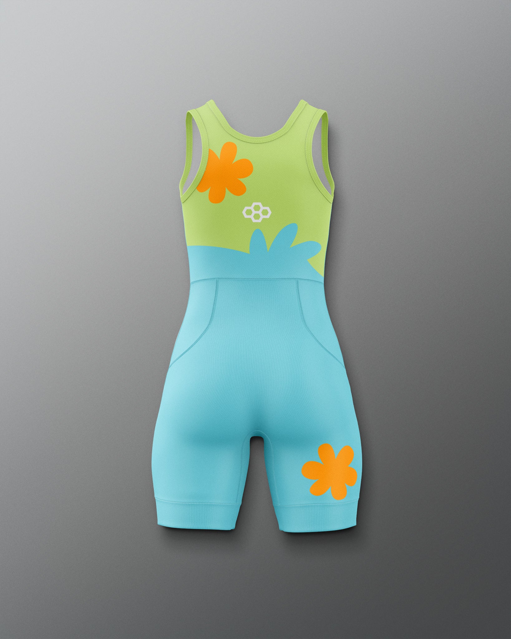 Back view of the RUDIS Scooby-Doo Mystery Machine Girls' Elite 2.0 wrestling singlet featuring a racerback design, lime green and turquoise color blocking, orange flower graphics, and white RUDIS logo.