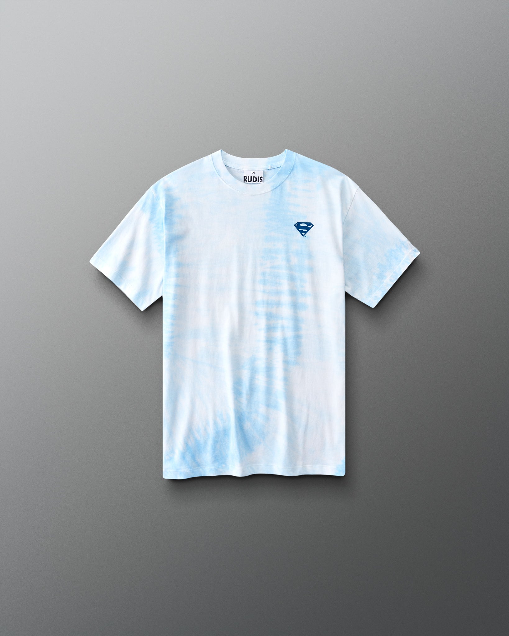 RUDIS Superman Comic Youth Classic Cotton T-Shirt in blue tie-dye with a blue Superman shield logo on the chest.
