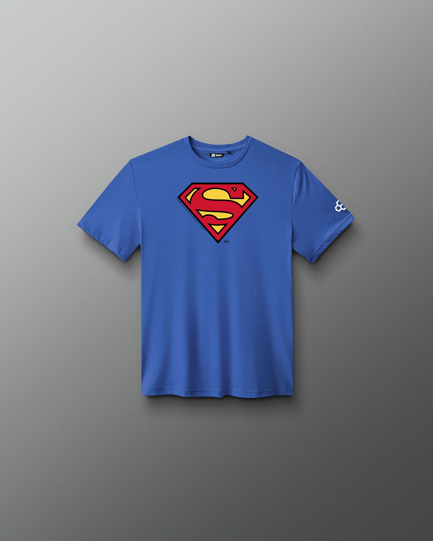 RUDIS Superman Icon Youth Elite Supersoft T-Shirt in royal blue featuring the classic red and yellow Superman shield graphic.
