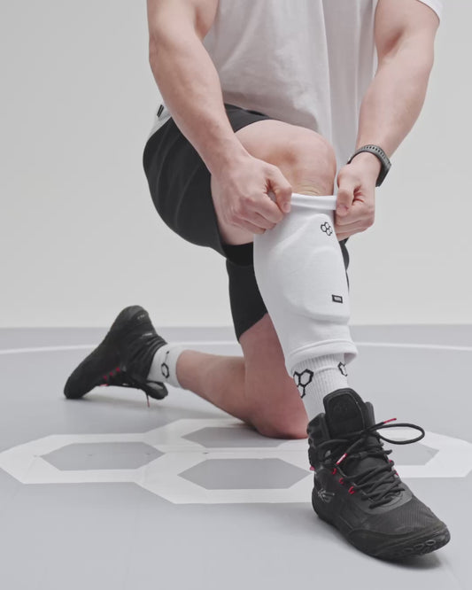 Genouillère de lutte RUDIS Omni-Impact blanche